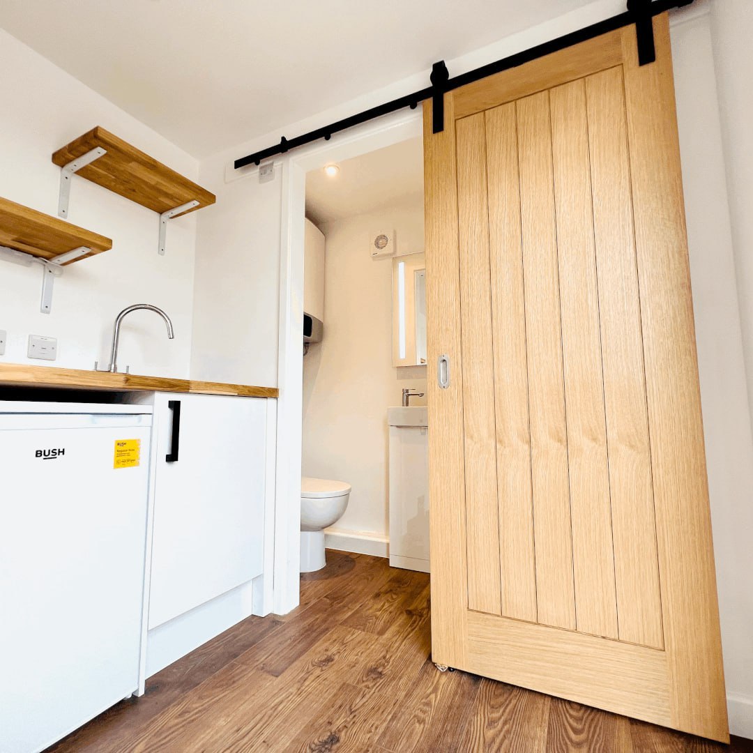 Garden office interior with kitchenette and ensuite